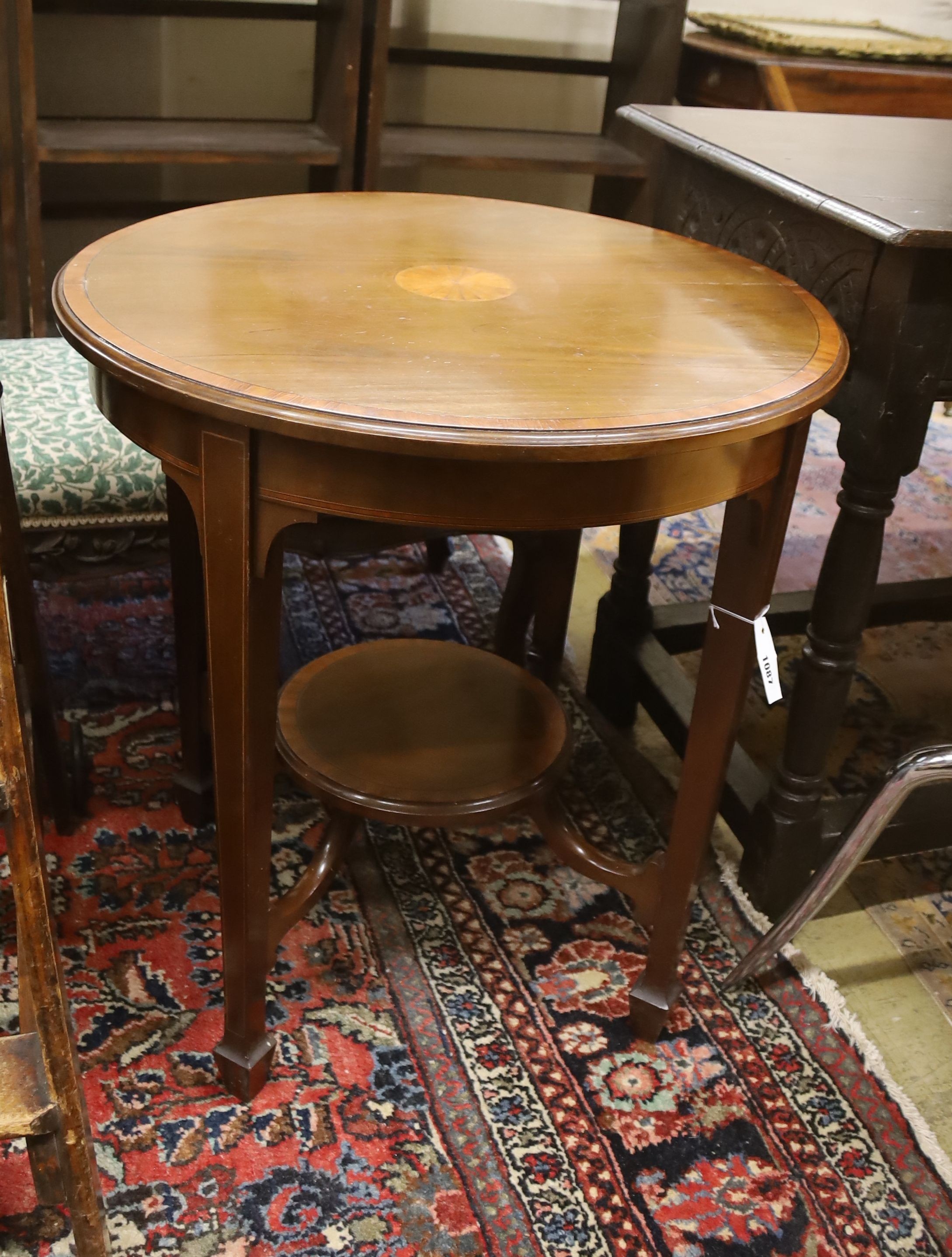 An Edwardian inlaid mahogany circular centre table, diameter 65cm, height 71cm